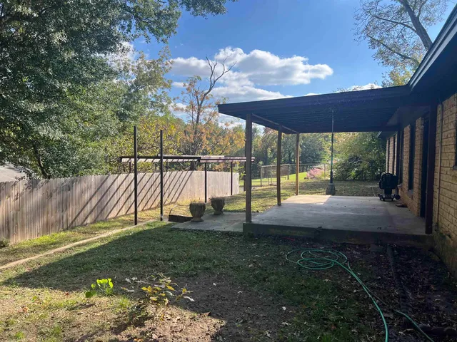 a view of a yard with a slide