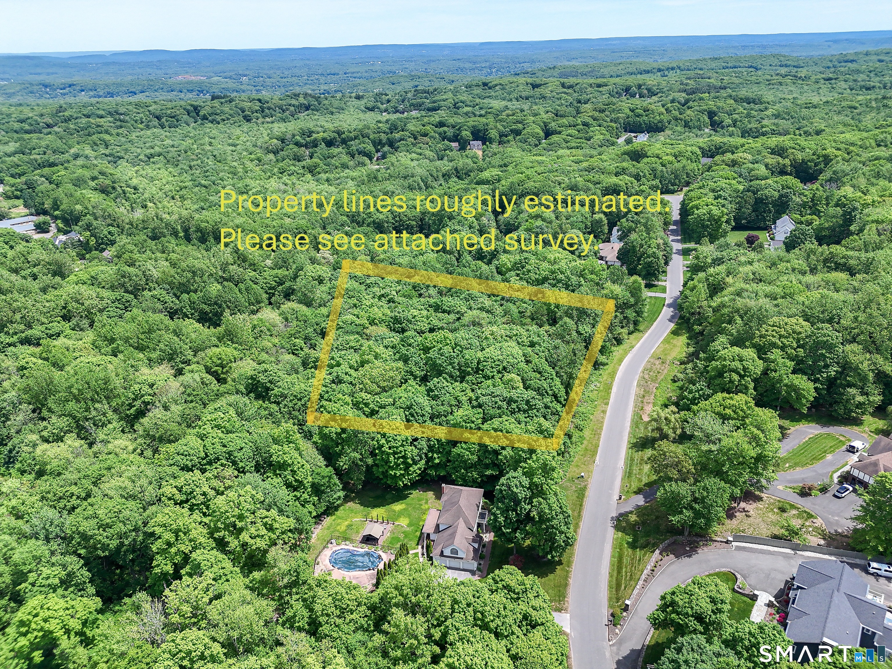 7 Holley Lane Prospect, CT 06712 - Photo 16 of 30 a view of a lush green forest with trees and some houses