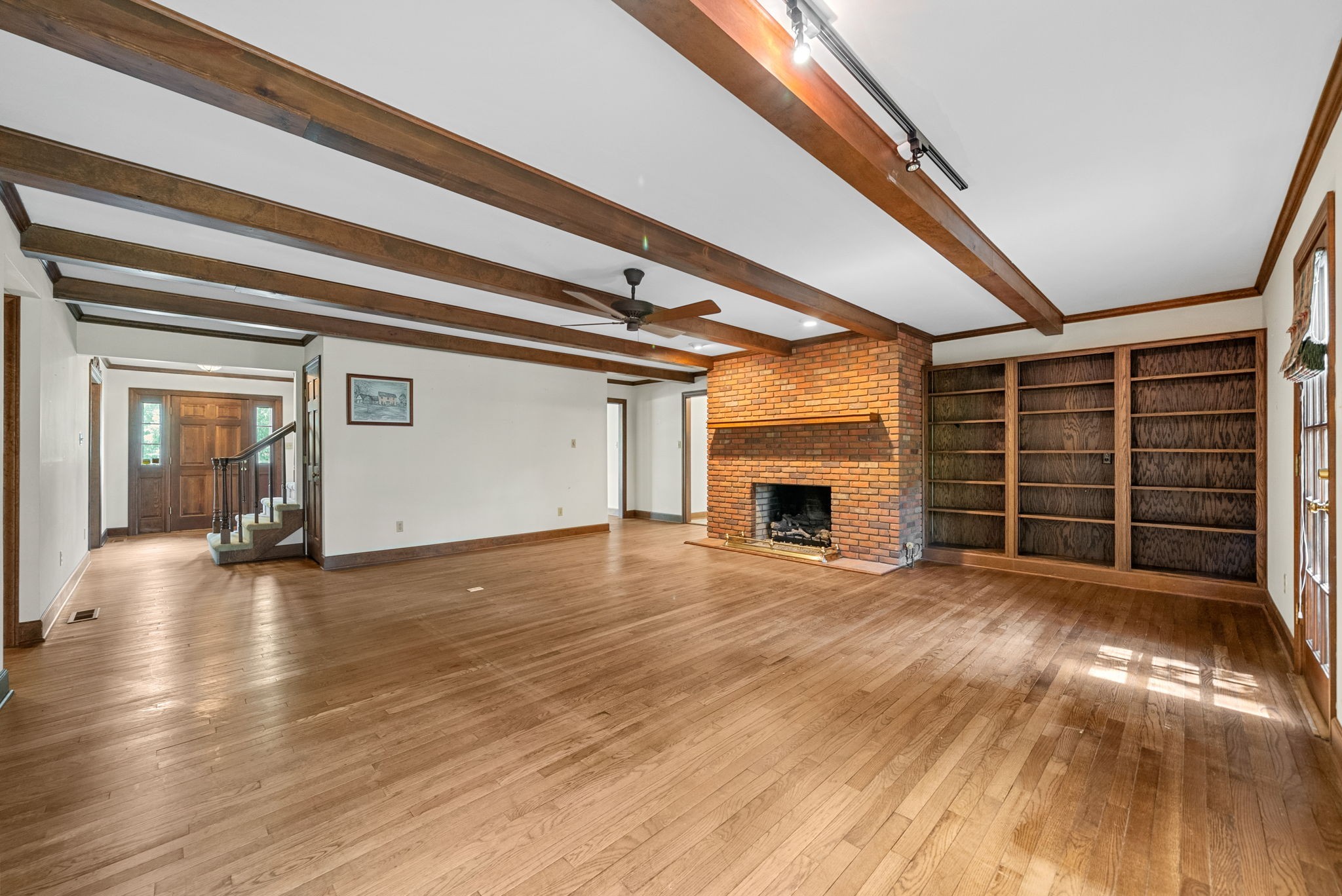 3058 Cox Mill Road Hopkinsville, KY 42240 - Photo 13 of 60 a view of empty room with wooden floor and fireplace