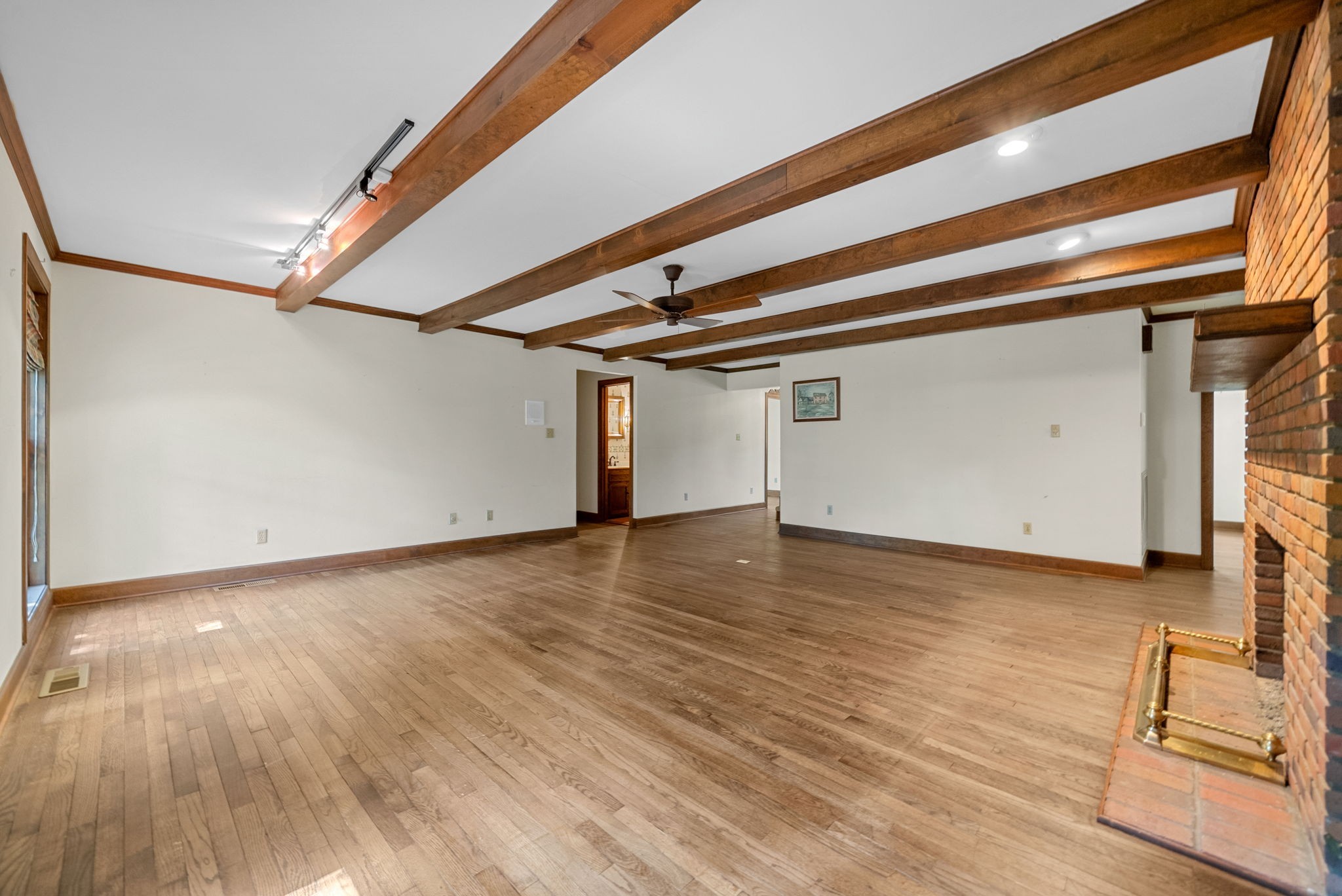 3058 Cox Mill Road Hopkinsville, KY 42240 - Photo 14 of 60 a view of a room with wooden floor and stairs