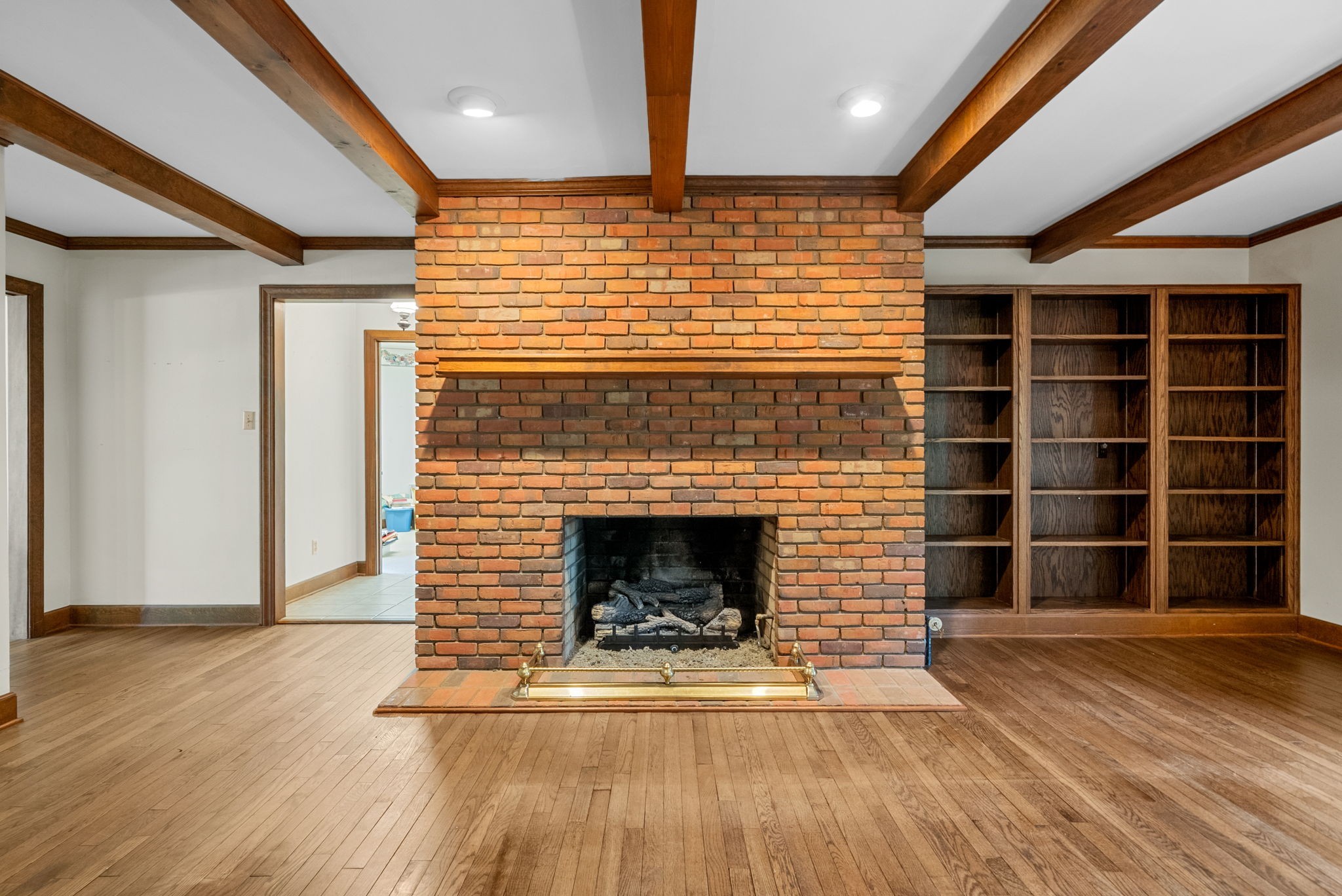 3058 Cox Mill Road Hopkinsville, KY 42240 - Photo 15 of 60 a view of an empty room with wooden floor and a window
