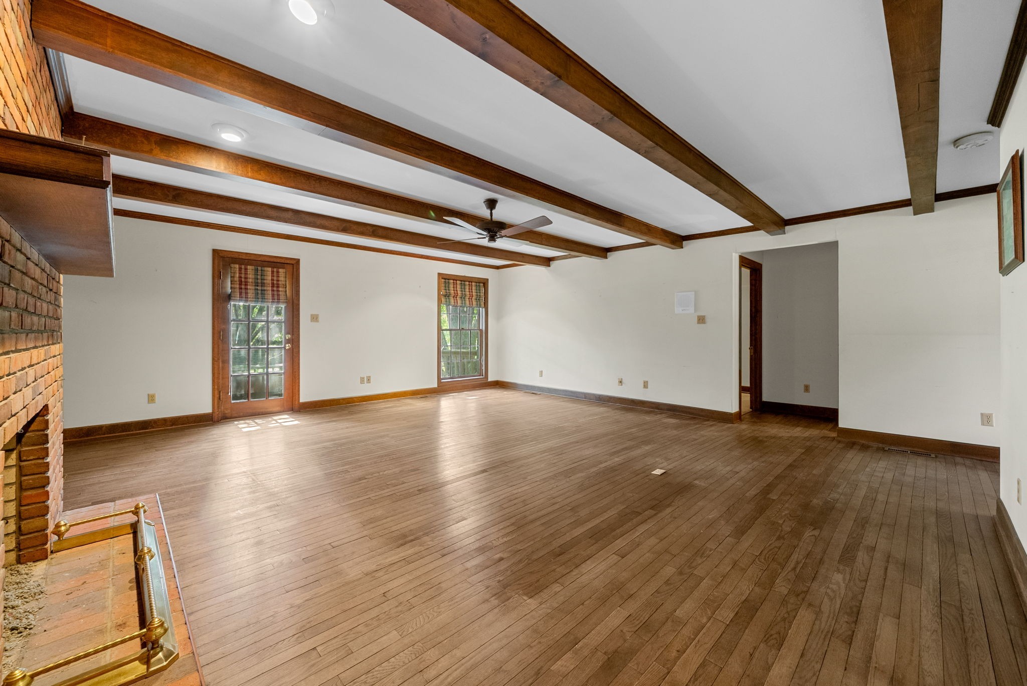 3058 Cox Mill Road Hopkinsville, KY 42240 - Photo 16 of 60 a view of a livingroom with wooden floor and staircase