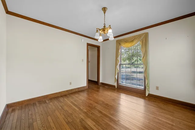 a bathroom with a sink toilet and mirror