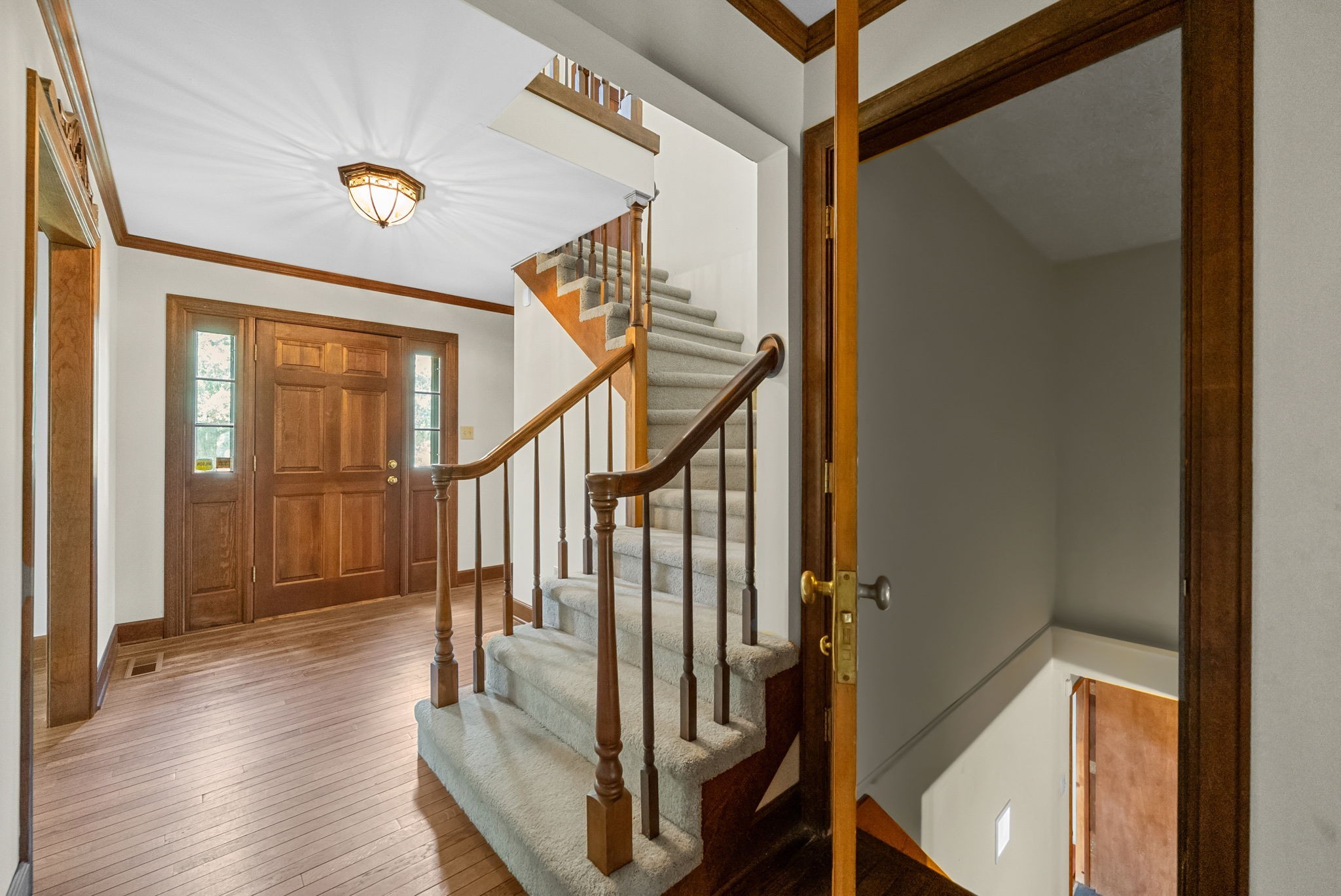 3058 Cox Mill Road Hopkinsville, KY 42240 - Photo 9 of 60 a view of entryway with wooden floor and stairs