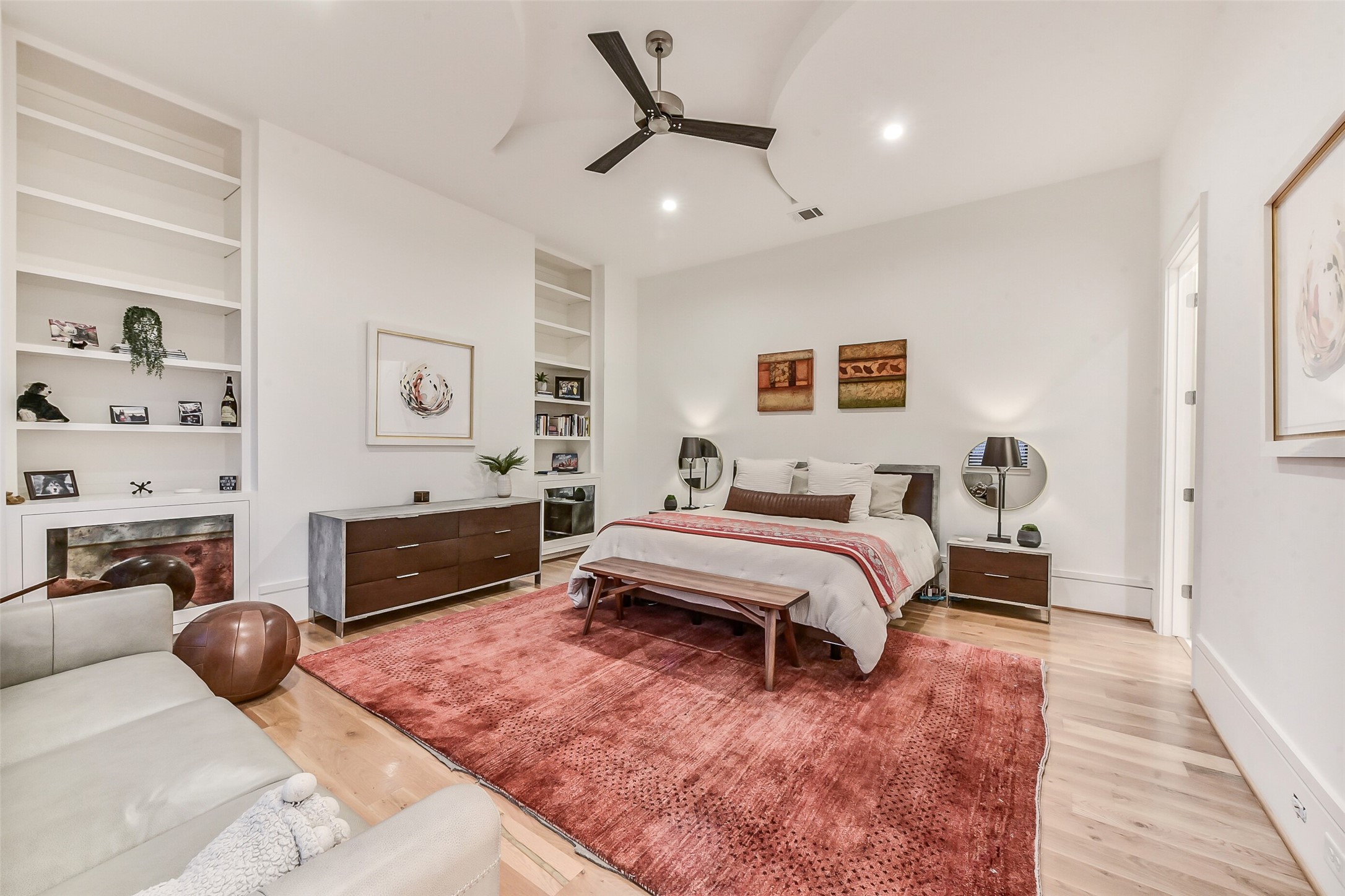 2205 Goldsmith Street Houston, TX 77030 - Photo 14 of 44 a bedroom with furniture and a wooden floor