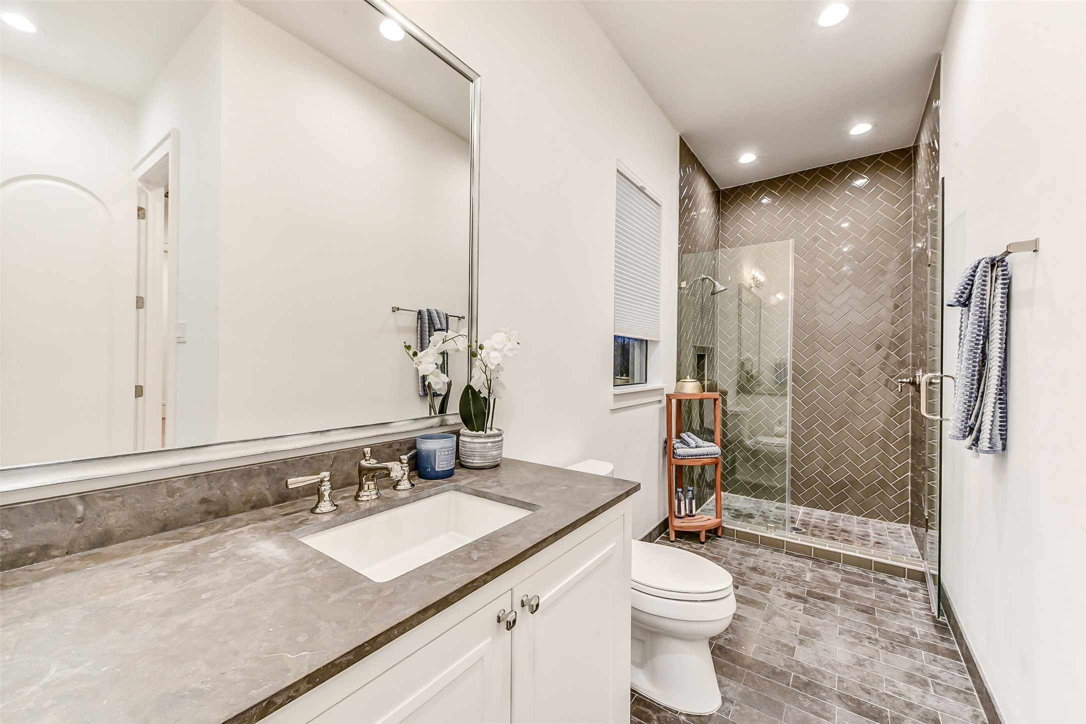 2205 Goldsmith Street Houston, TX 77030 - Photo 21 of 44 a bathroom with a sink a toilet and shower