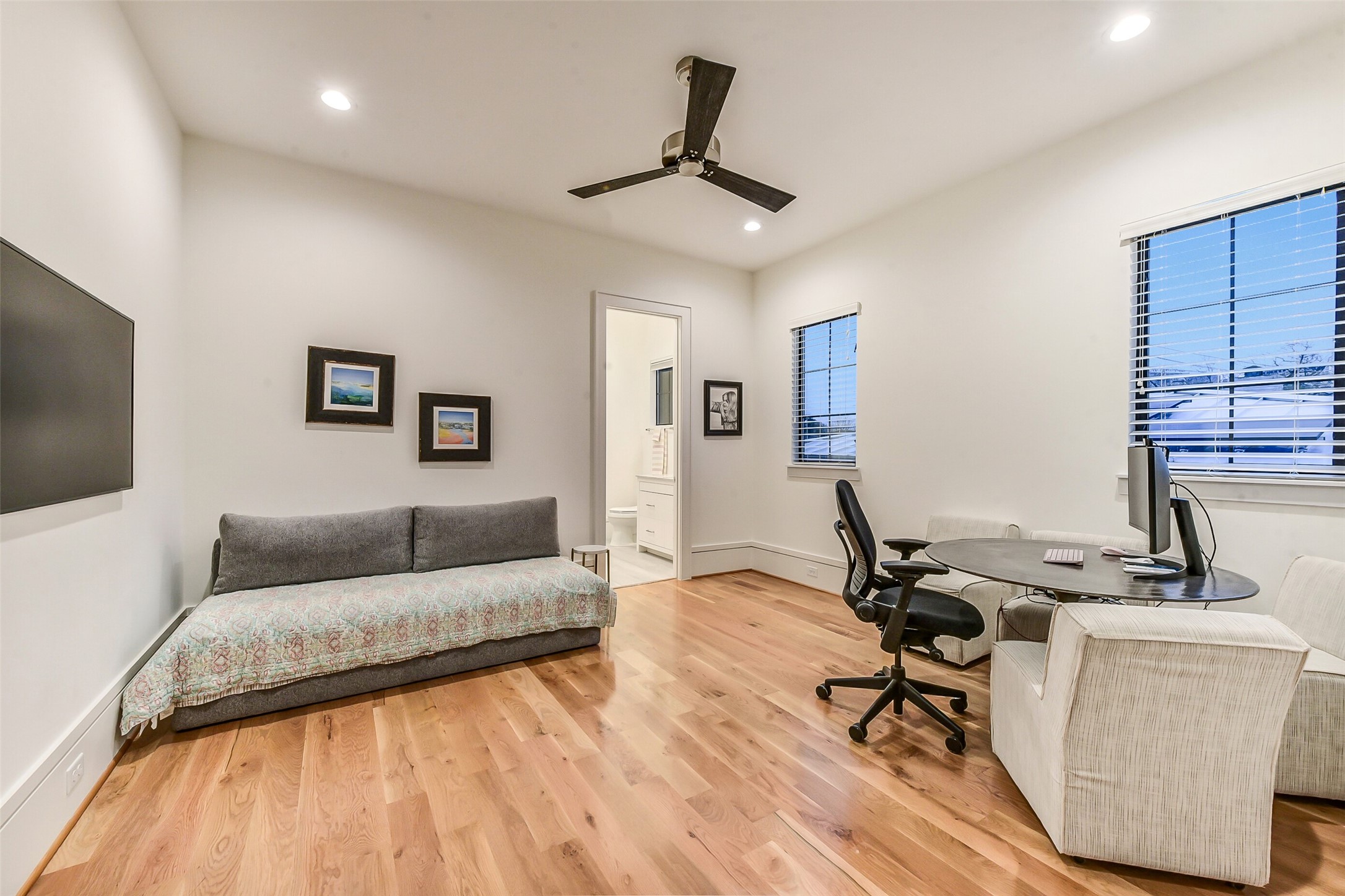 2205 Goldsmith Street Houston, TX 77030 - Photo 24 of 44 a living room with furniture and a flat screen tv