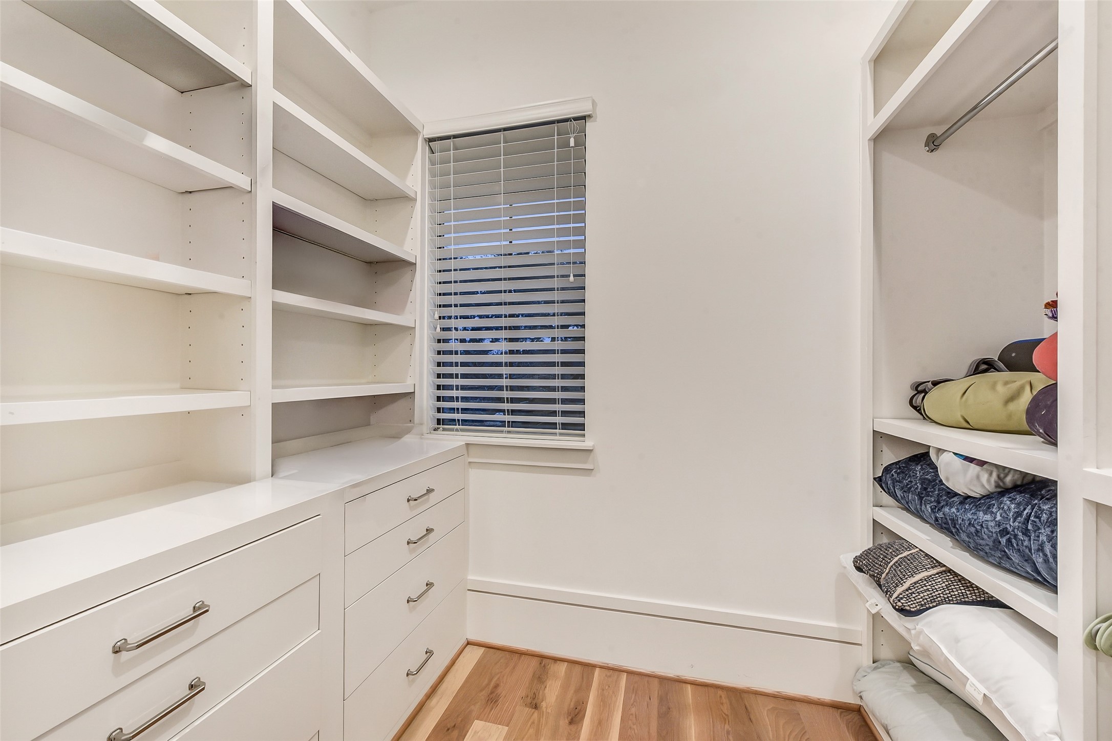 2205 Goldsmith Street Houston, TX 77030 - Photo 26 of 44 a kitchen with a refrigerator and white cabinets