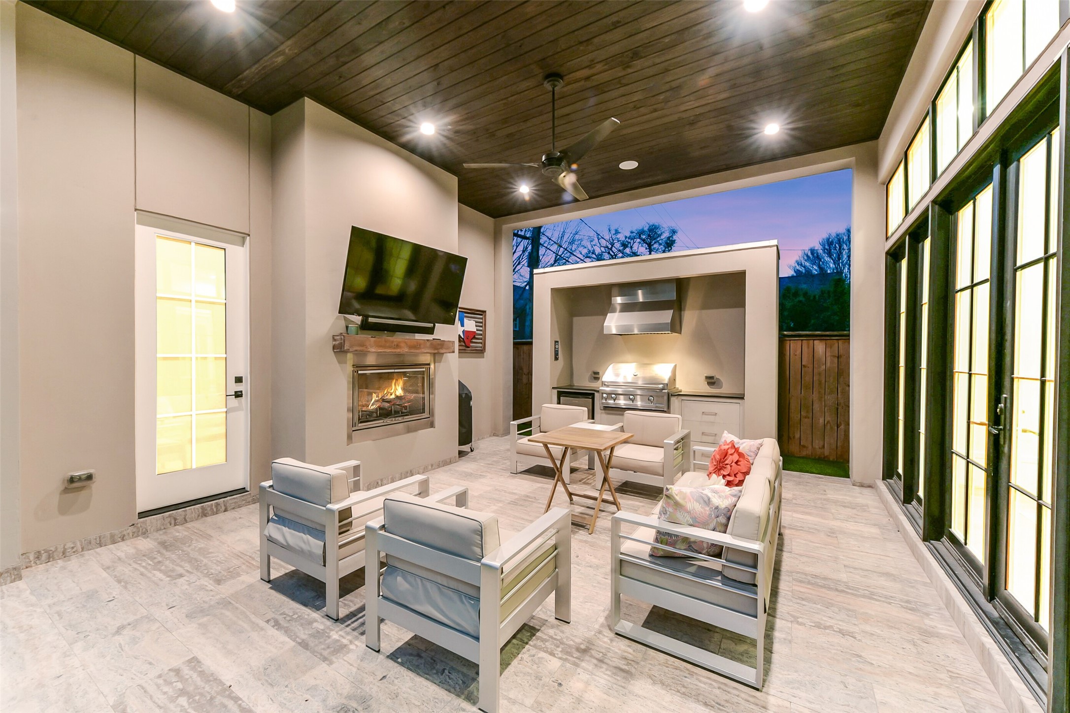 2205 Goldsmith Street Houston, TX 77030 - Photo 28 of 44 a living room with fireplace furniture and a flat screen tv