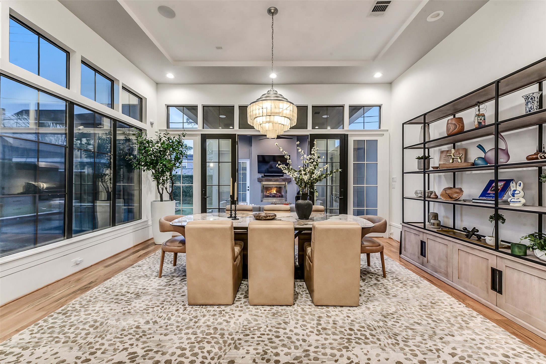 2205 Goldsmith Street Houston, TX 77030 - Photo 30 of 44 a living room with furniture a chandelier and a rug