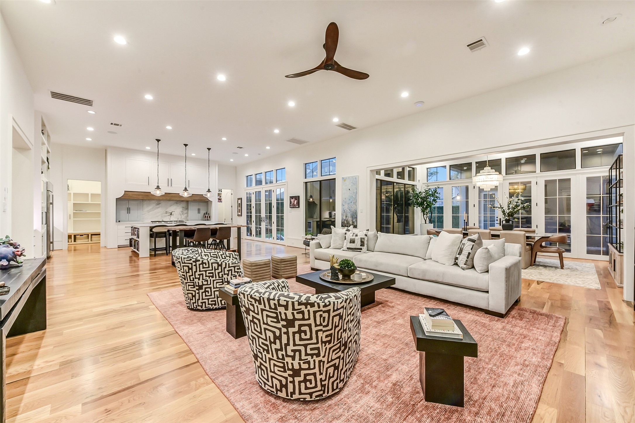 2205 Goldsmith Street Houston, TX 77030 - Photo 3 of 44 a living room with furniture kitchen view and large windows