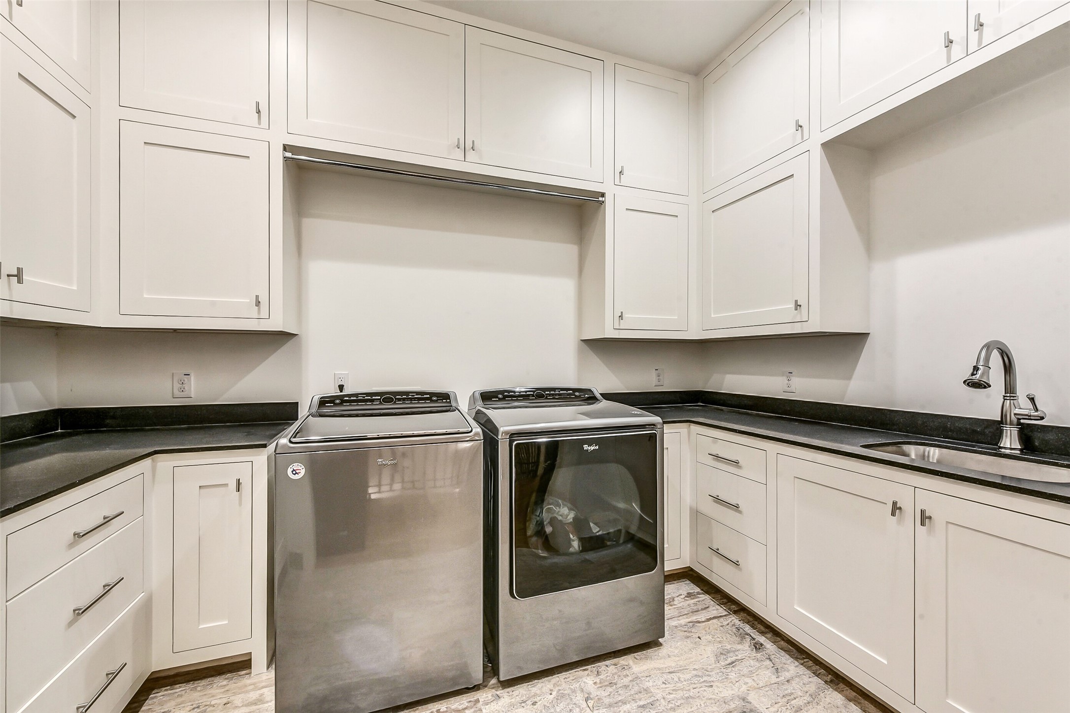 2205 Goldsmith Street Houston, TX 77030 - Photo 35 of 44 a kitchen with granite countertop white cabinets and a stove