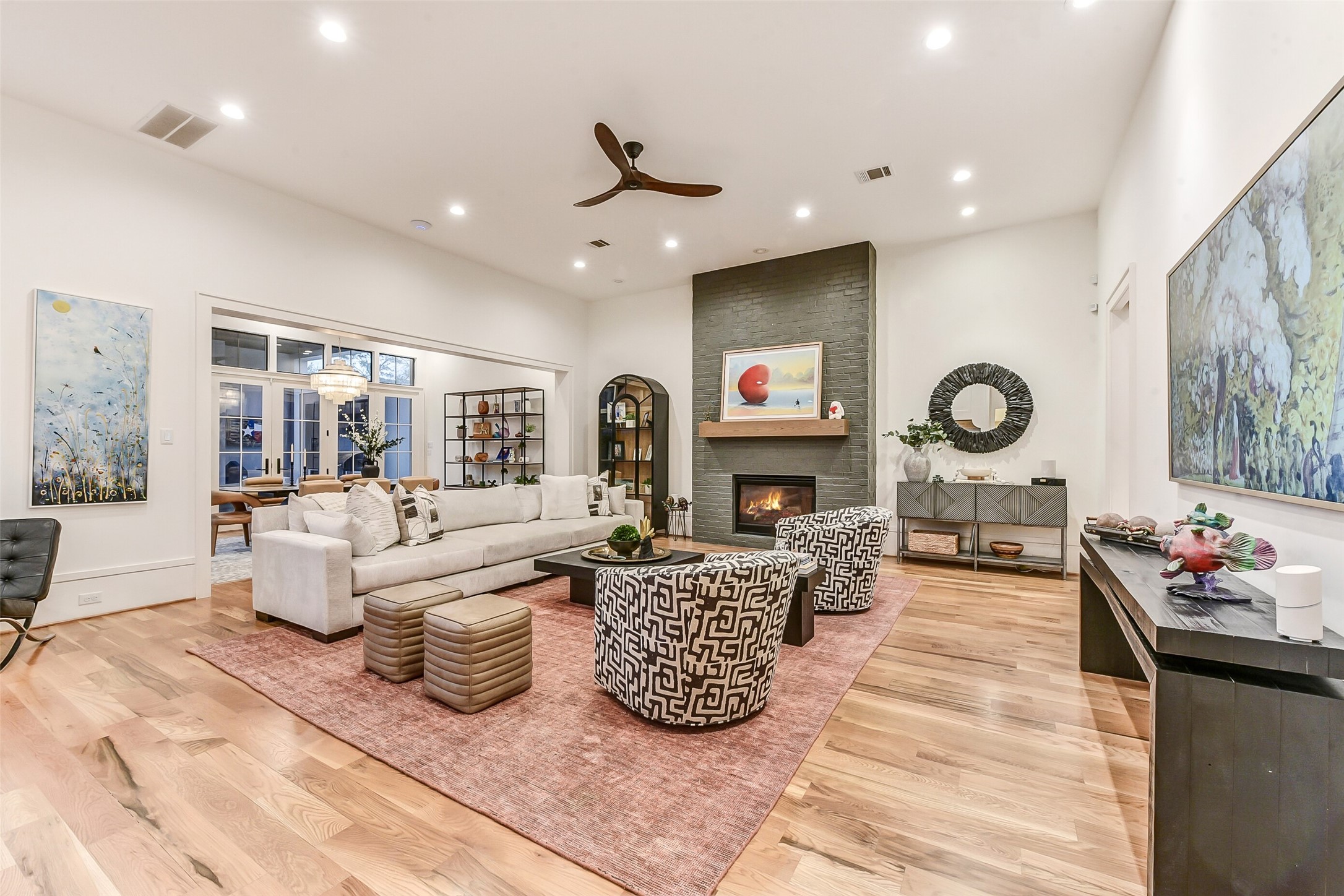 2205 Goldsmith Street Houston, TX 77030 - Photo 4 of 44 a living room with fireplace furniture and a large window