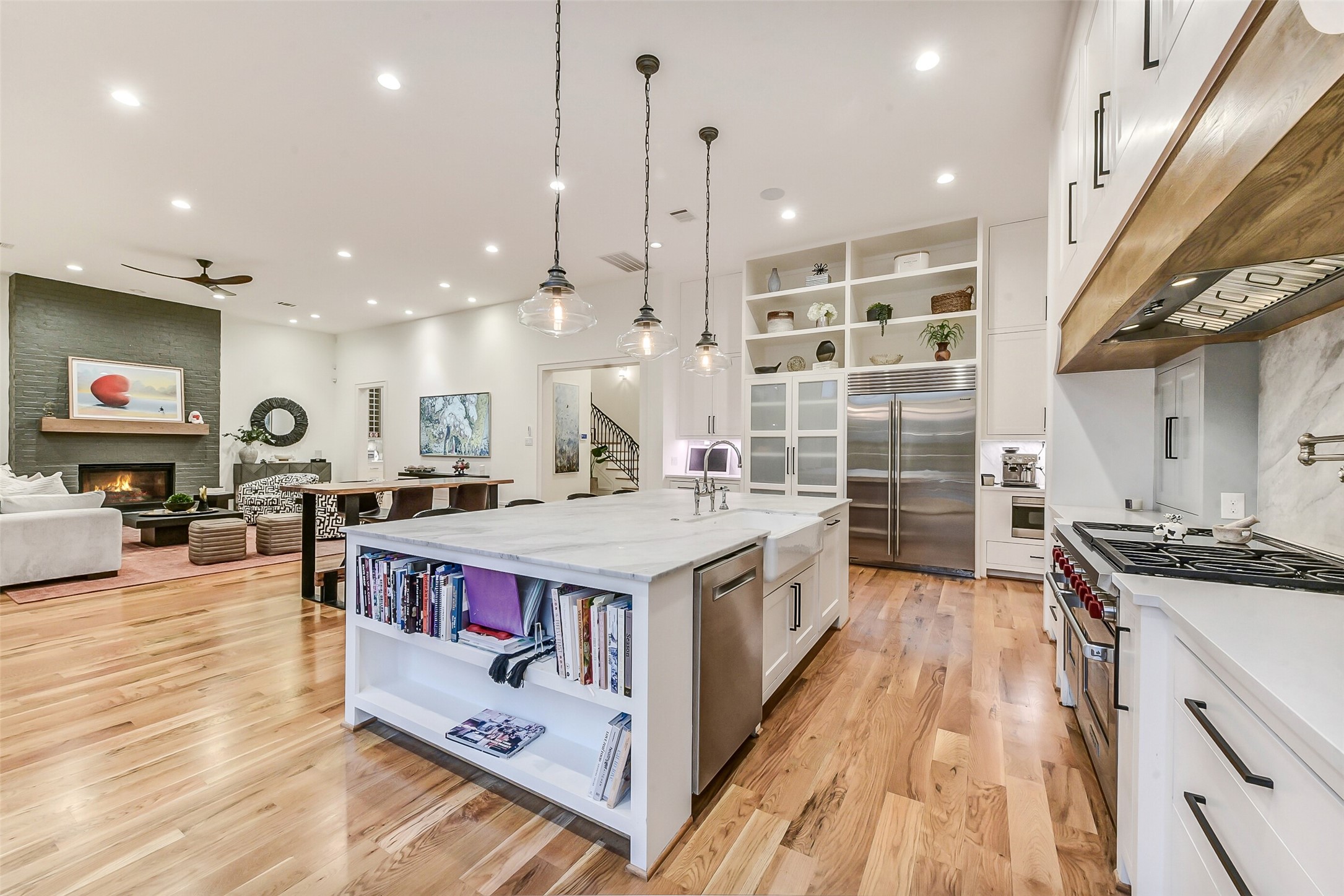 2205 Goldsmith Street Houston, TX 77030 - Photo 6 of 44 a kitchen with stainless steel appliances granite countertop a stove and a wooden floors