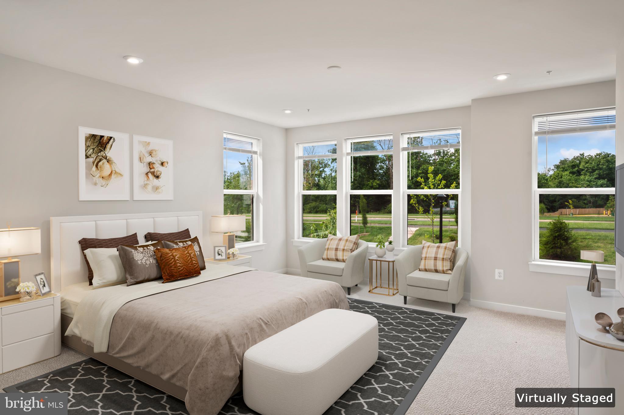 20364 Newfoundland Square Ashburn, VA 20147 - Photo 26 of 68 a bedroom with a bed and glass window