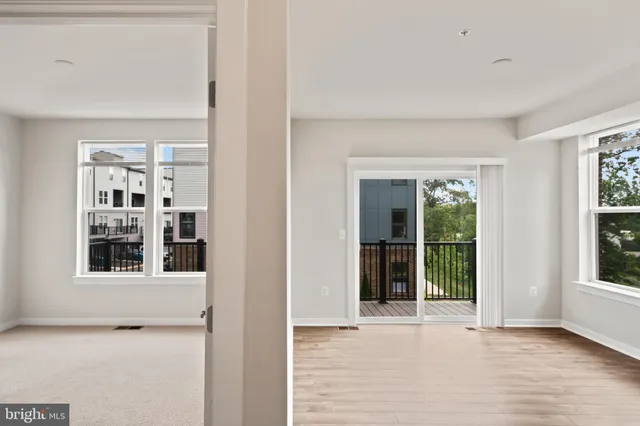 a view of a room with a large window
