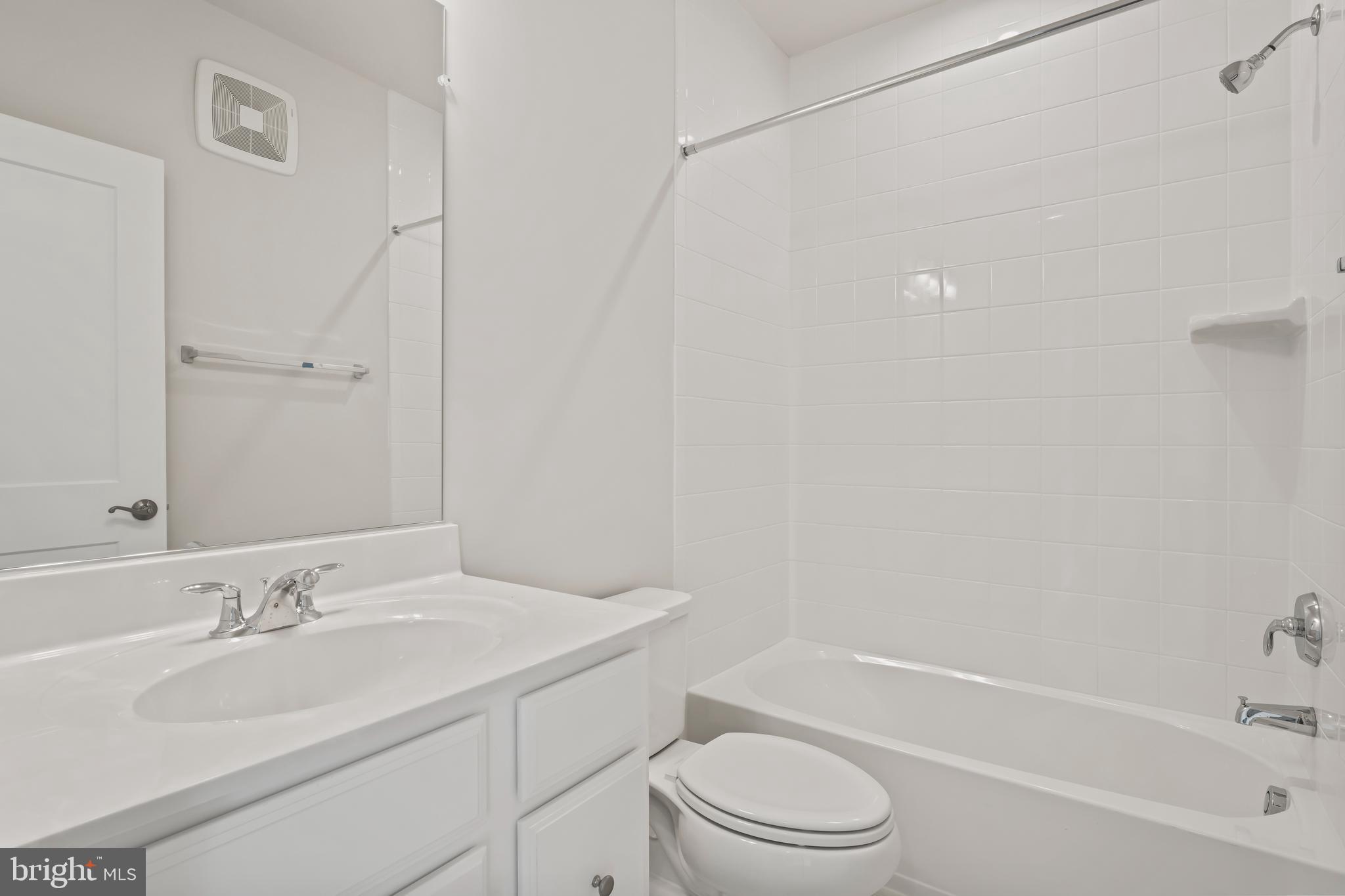 20364 Newfoundland Square Ashburn, VA 20147 - Photo 46 of 68 a bathroom with a granite countertop sink toilet and shower