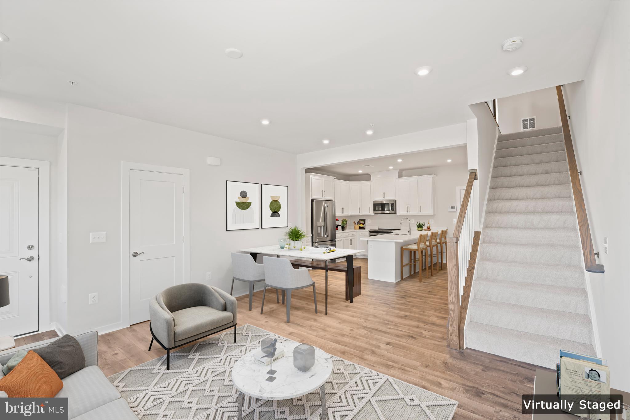 20364 Newfoundland Square Ashburn, VA 20147 - Photo 8 of 68 a living room with furniture and a dining table with wooden floor