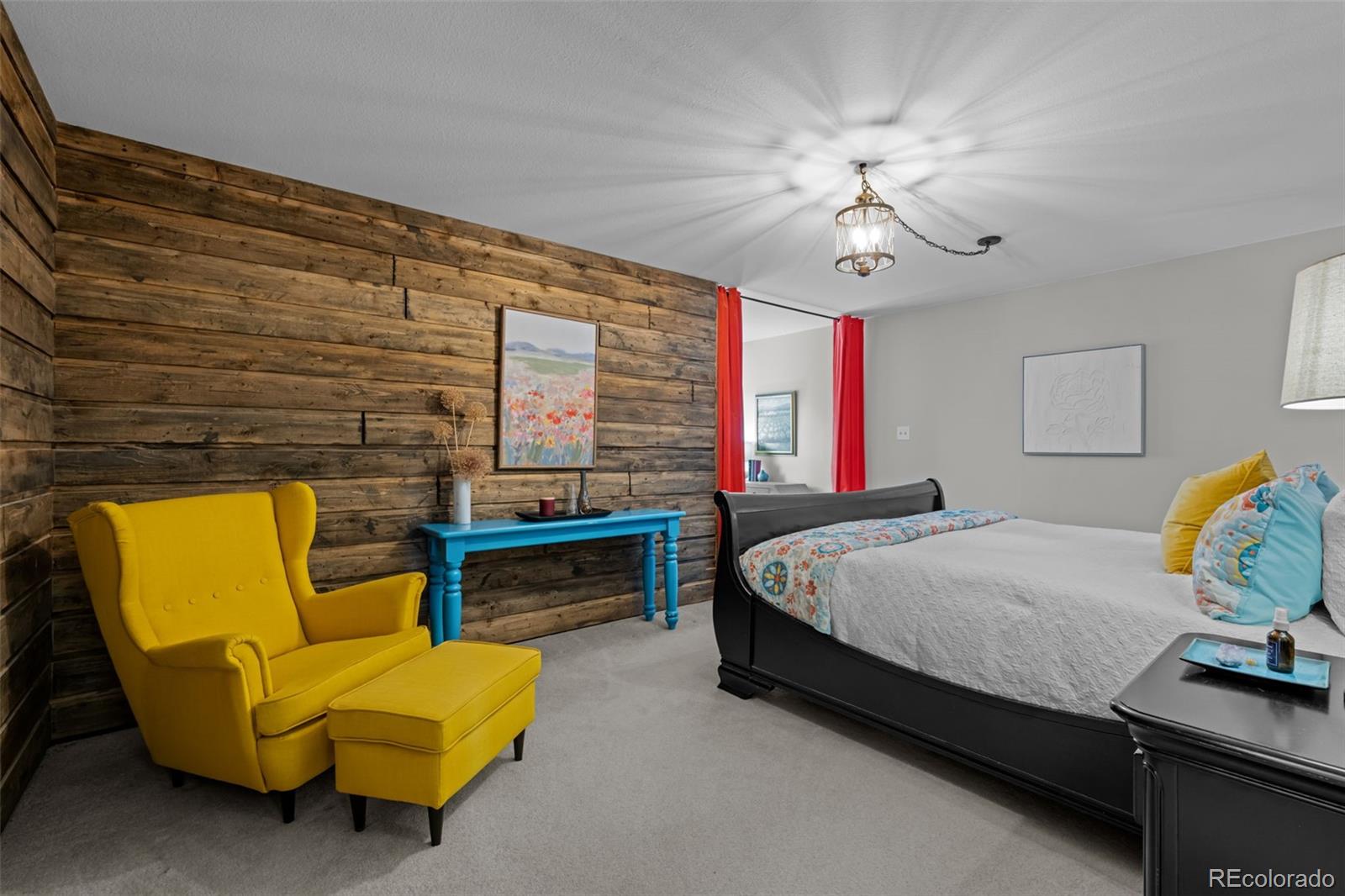 1 Rangeview Drive Wheat Ridge, CO 80215 - Photo 16 of 45 a bedroom with a bed and ceiling fan