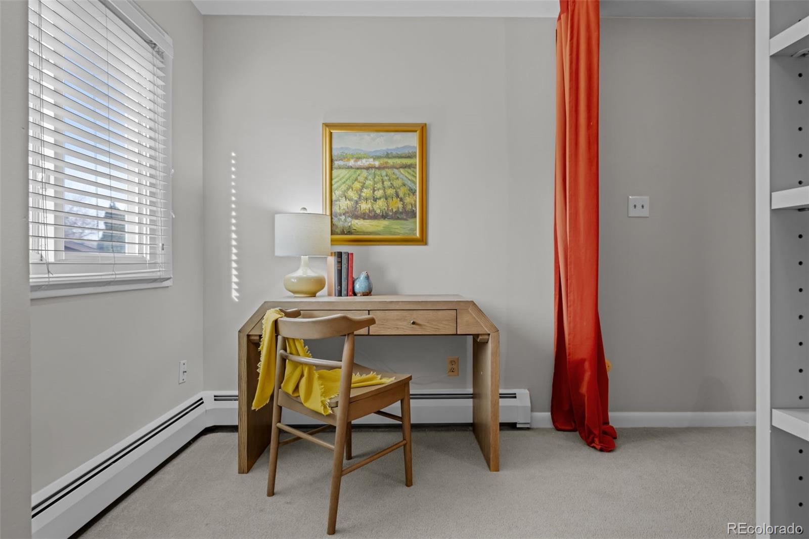 1 Rangeview Drive Wheat Ridge, CO 80215 - Photo 17 of 45 a view of a workspace with furniture and a window
