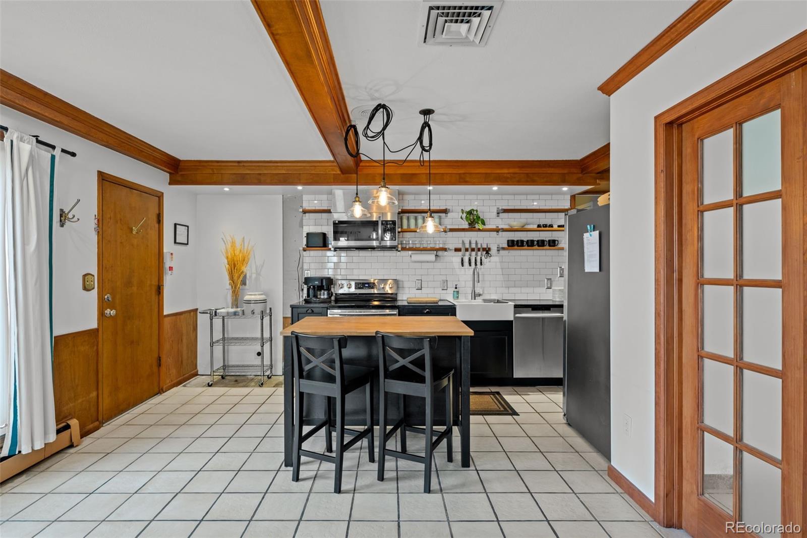 1 Rangeview Drive Wheat Ridge, CO 80215 - Photo 29 of 45 a view of a dining room with furniture