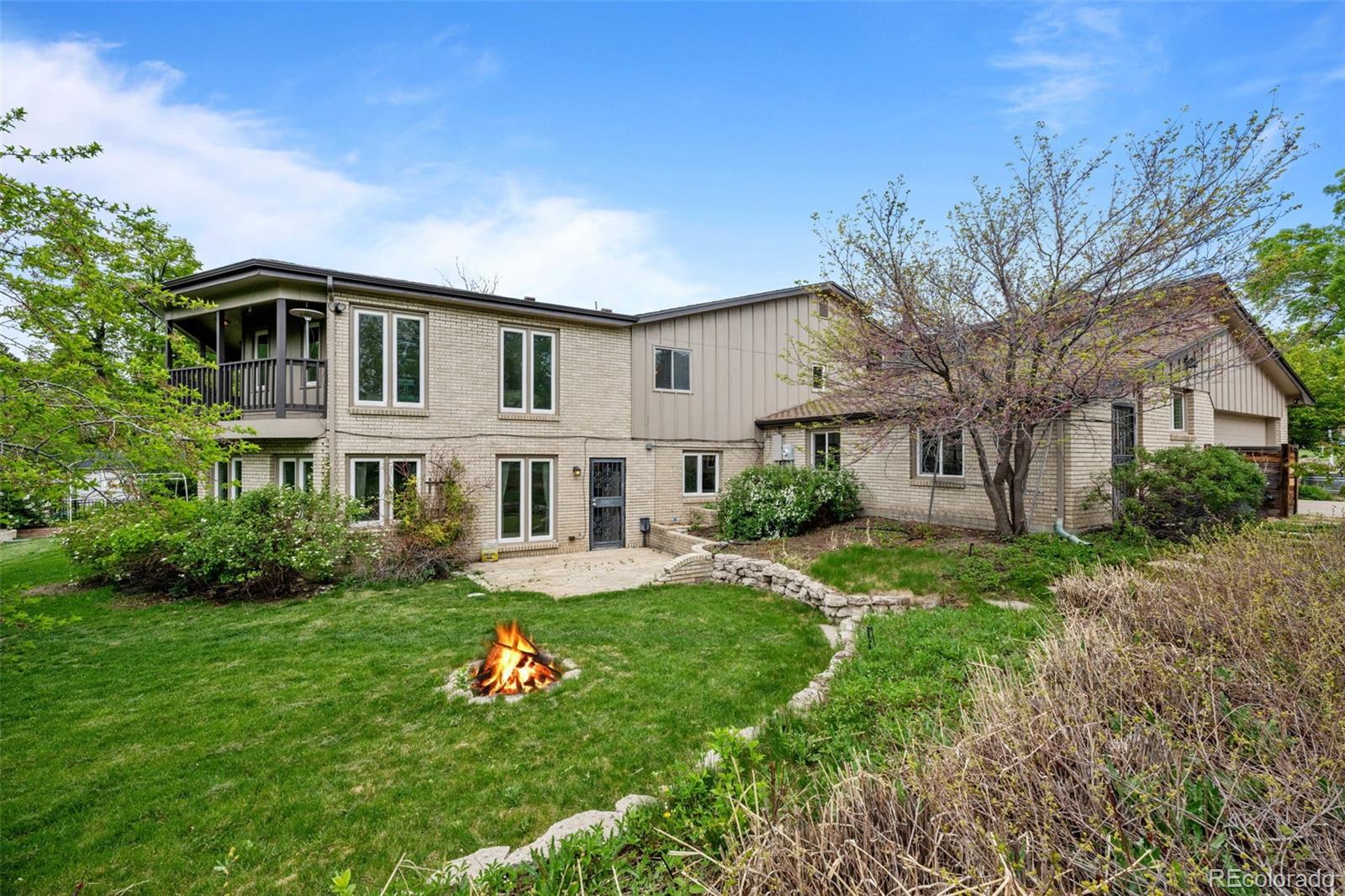 1 Rangeview Drive Wheat Ridge, CO 80215 - Photo 38 of 45 a front view of a house with garden