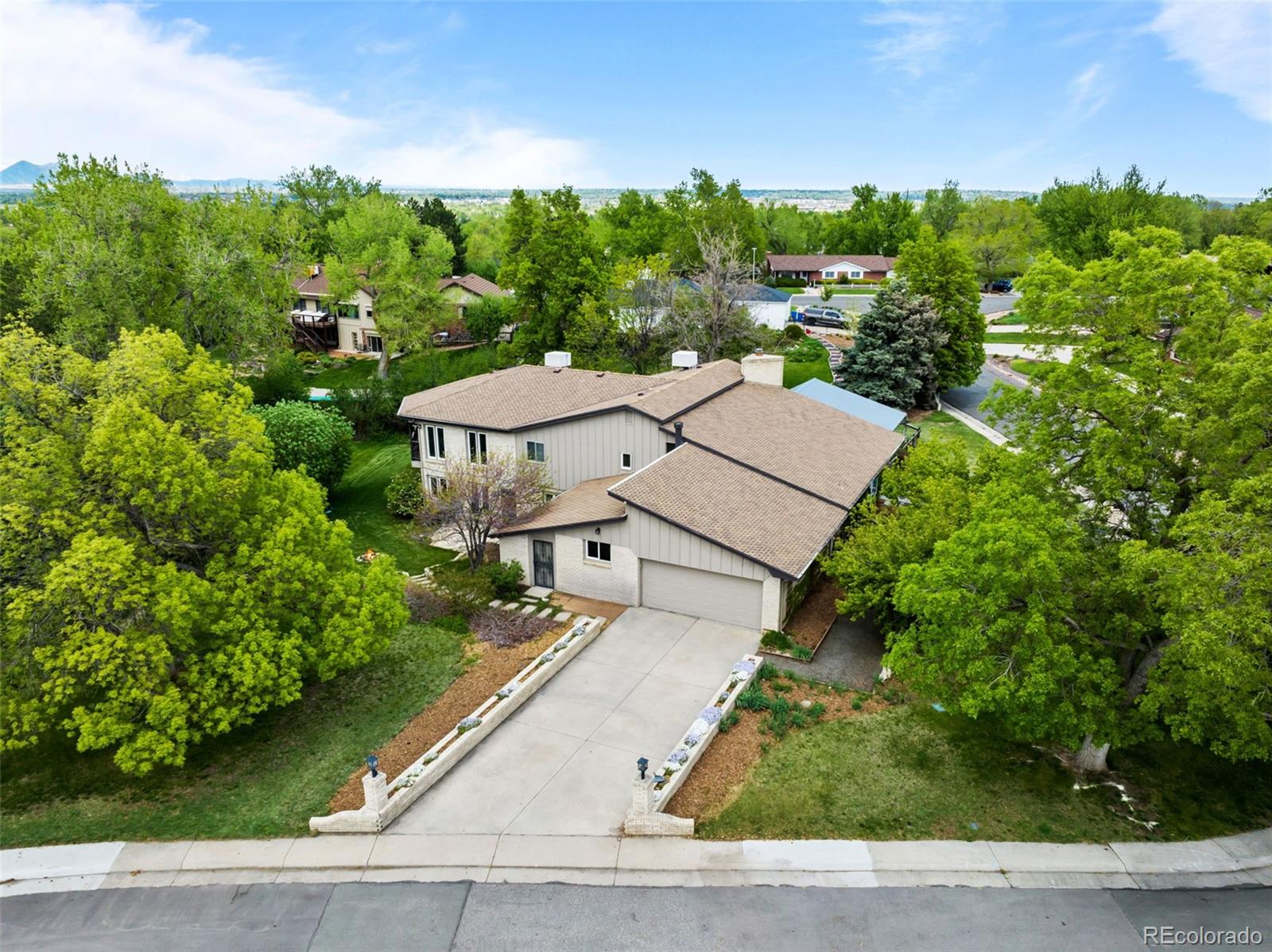 1 Rangeview Drive Wheat Ridge, CO 80215 - Photo 44 of 45 a view of a terrace with a garden