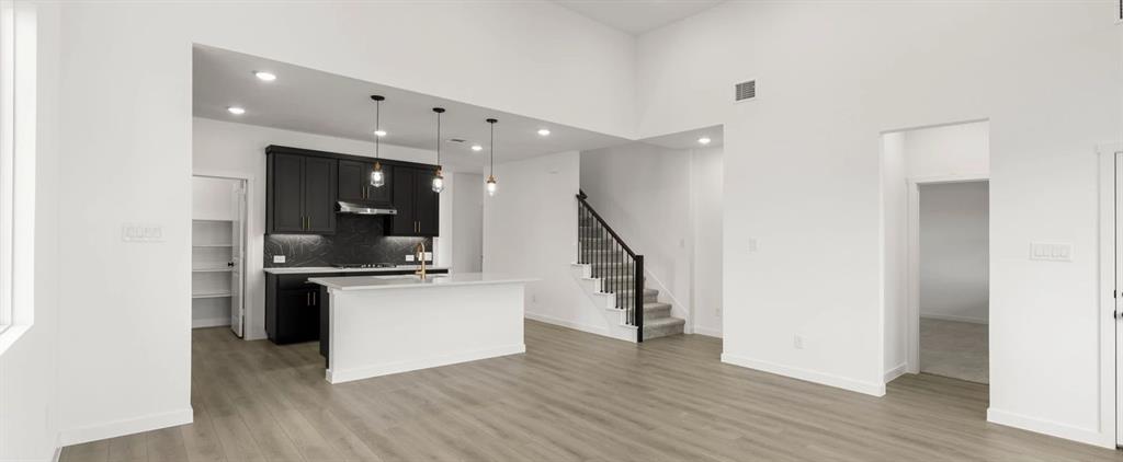 2306 Myrtle Way Melissa, TX 75454 - Photo 13 of 28 a kitchen with stainless steel appliances granite countertop a refrigerator and a stove top oven