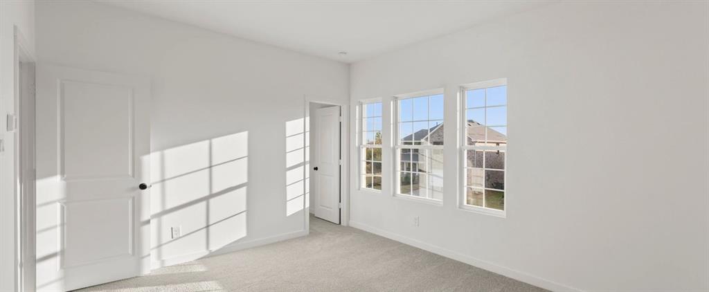 2306 Myrtle Way Melissa, TX 75454 - Photo 25 of 28 a view of empty room with windows