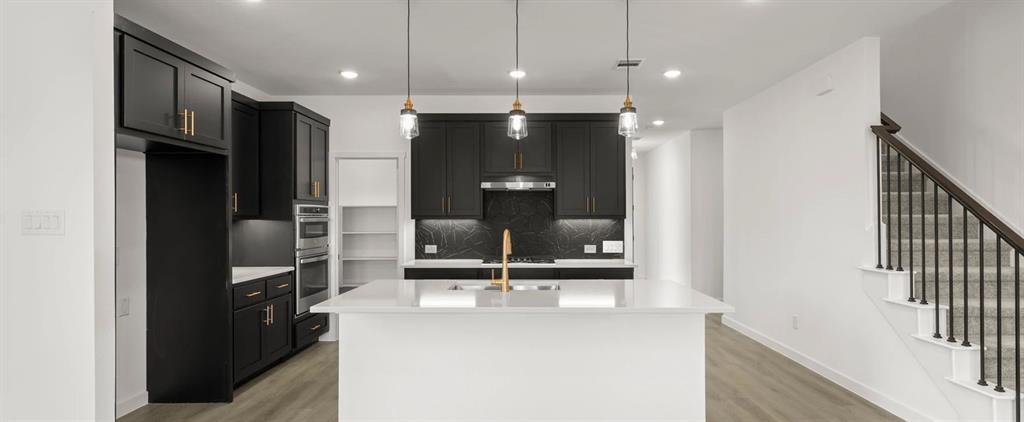 2306 Myrtle Way Melissa, TX 75454 - Photo 8 of 28 a view of a hallway with a kitchen