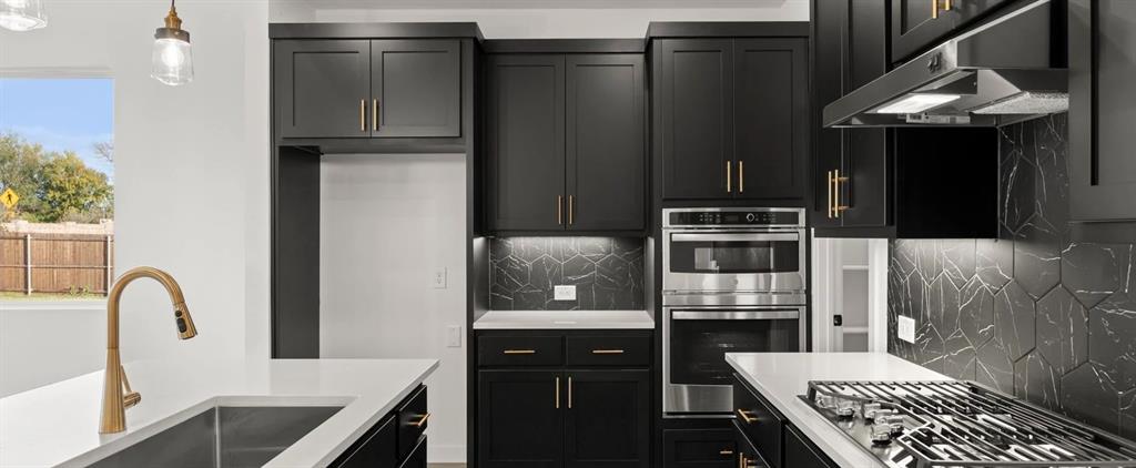 2306 Myrtle Way Melissa, TX 75454 - Photo 10 of 28 a kitchen with a refrigerator and a stove top oven