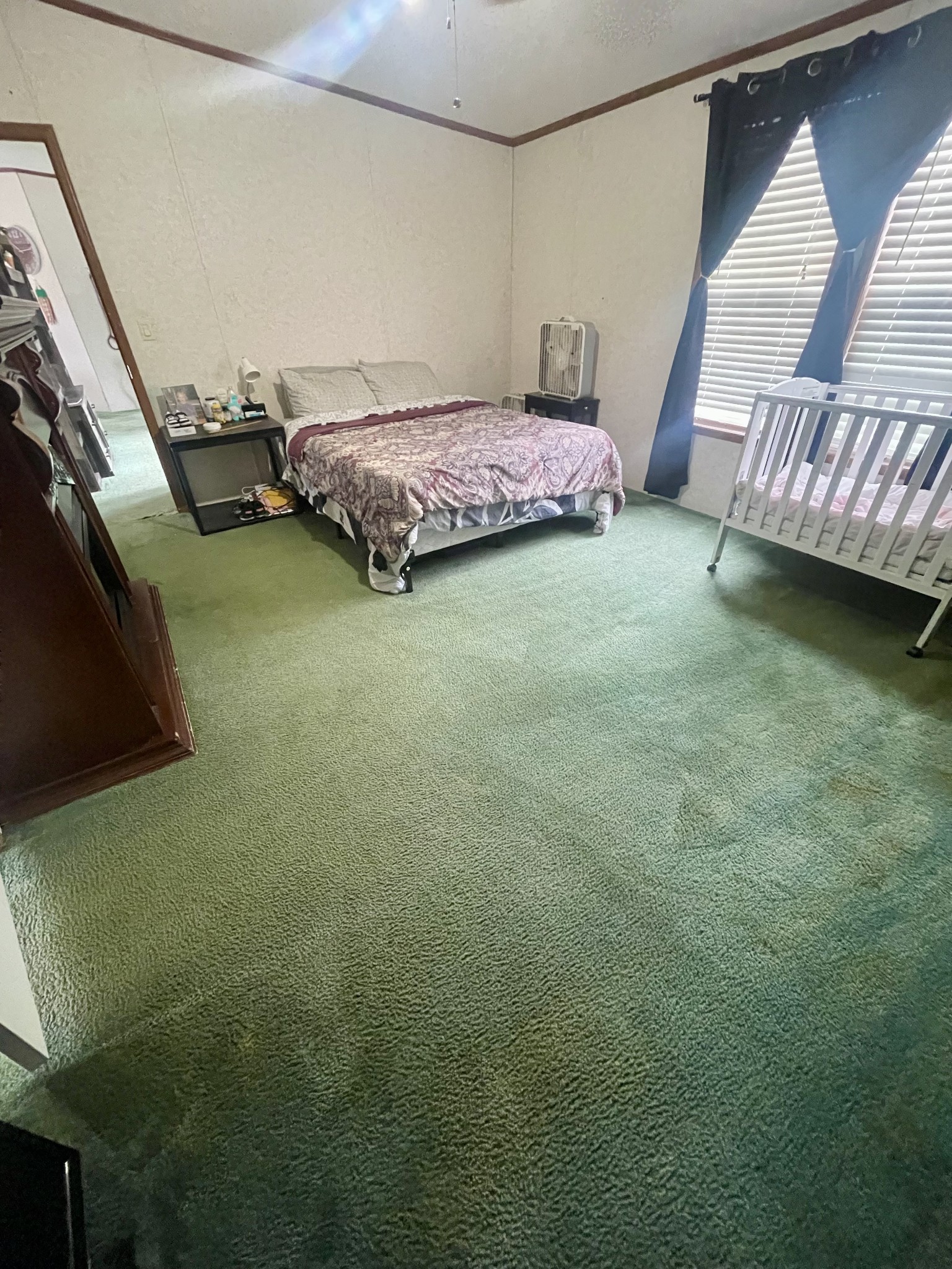 988 Womack Road McMinnville, TN 37110 - Photo 7 of 11 a bedroom with a bed and a window