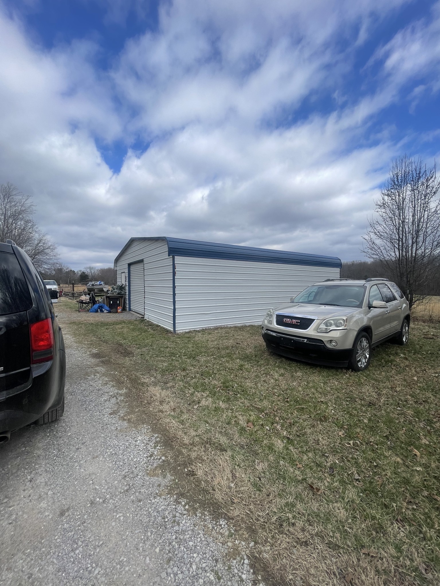 988 Womack Road McMinnville, TN 37110 - Photo 10 of 11 a view of car parked in middle of a field