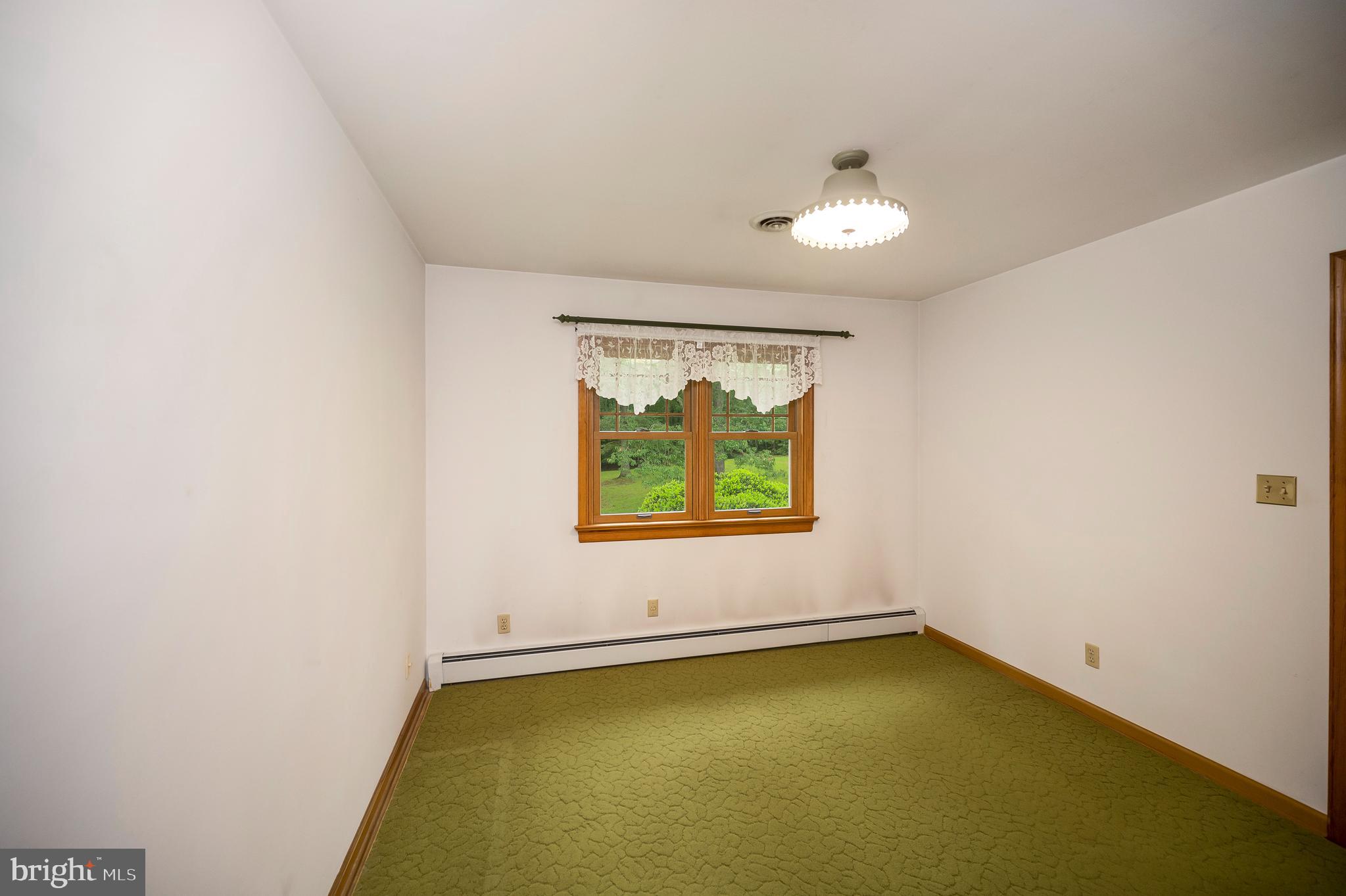 857 Mountain View Road Fredericksburg, VA 22406 - Photo 16 of 43 Bedroom #3 carpet is floating on hardwood floors