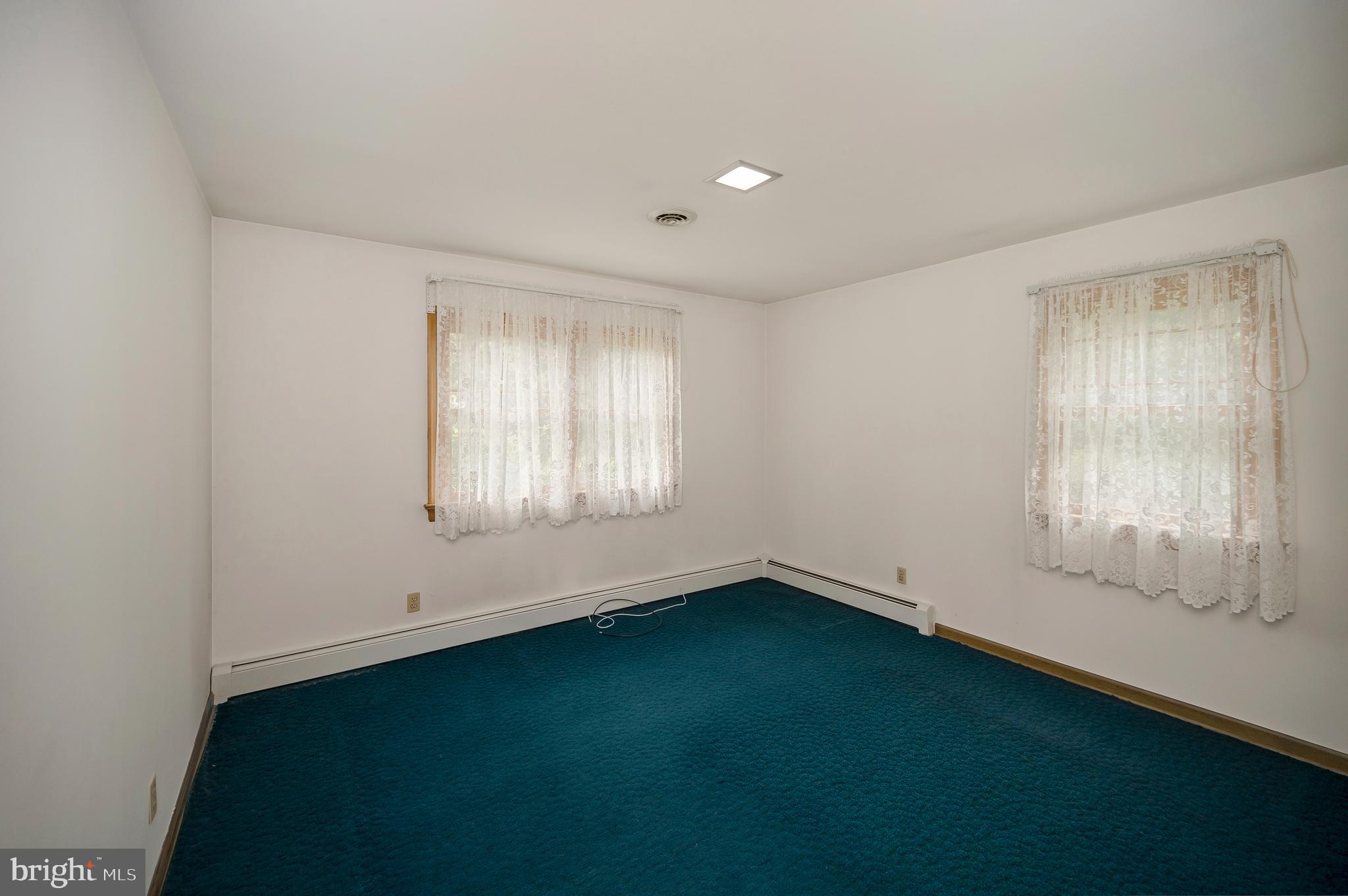 857 Mountain View Road Fredericksburg, VA 22406 - Photo 18 of 43 Bedroom #2 carpet is floating on hardwood floors