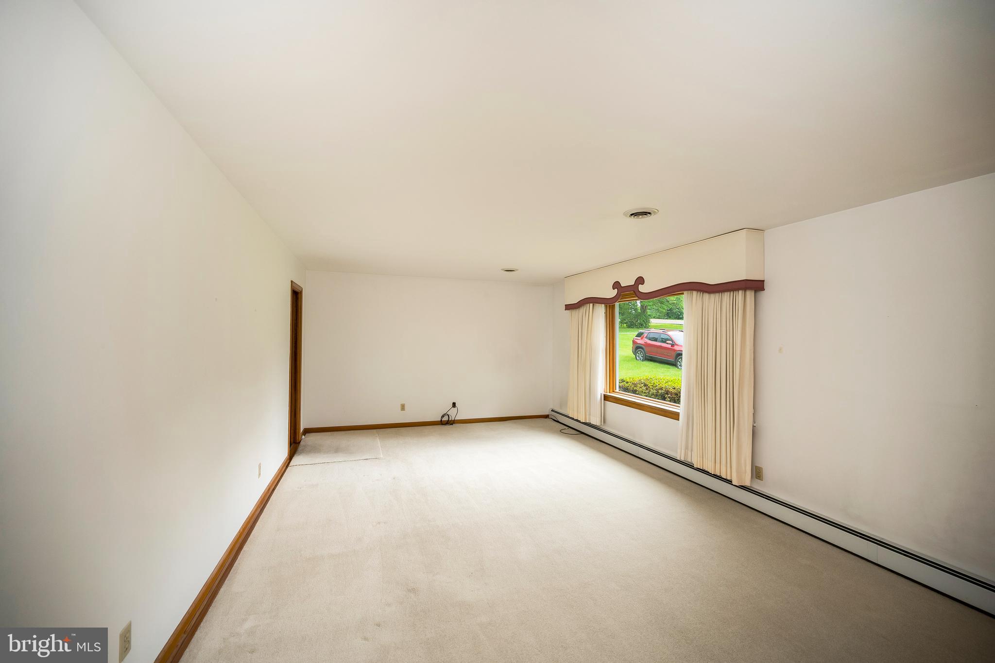 857 Mountain View Road Fredericksburg, VA 22406 - Photo 7 of 43 carpet is floating over hardwood floors