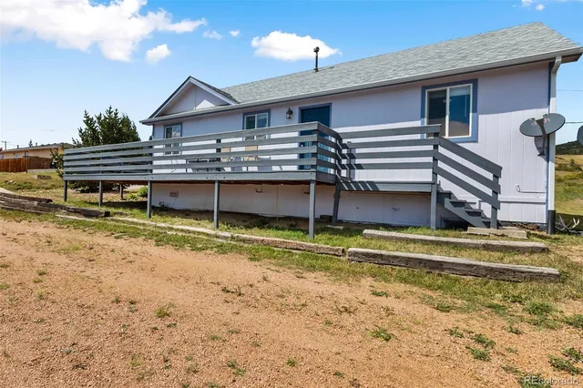 a house view with a garden space