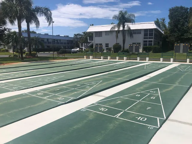 a view of a house with a fence