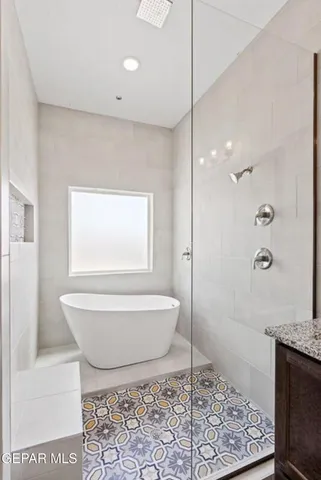 a bathroom with a toilet a sink and shower