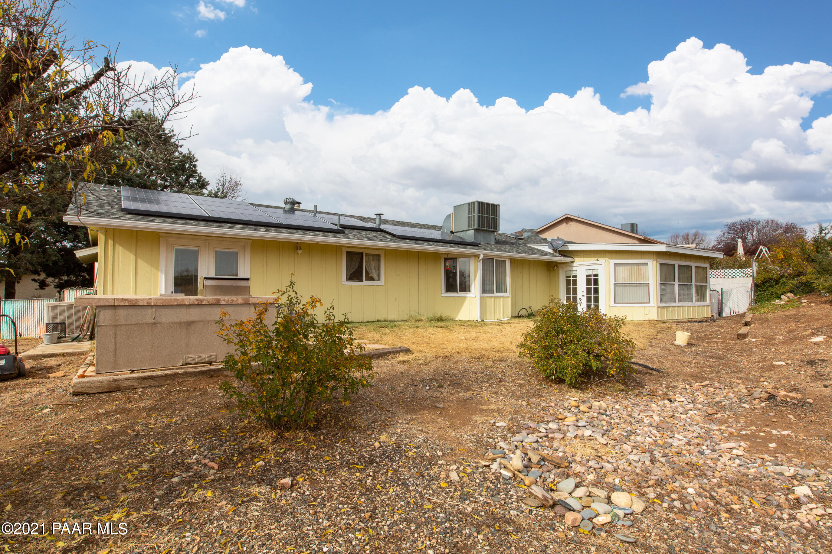 11991 Rawhide Ridge Dewey, AZ 86327 - Photo 28 of 29 front view of a house with a yard