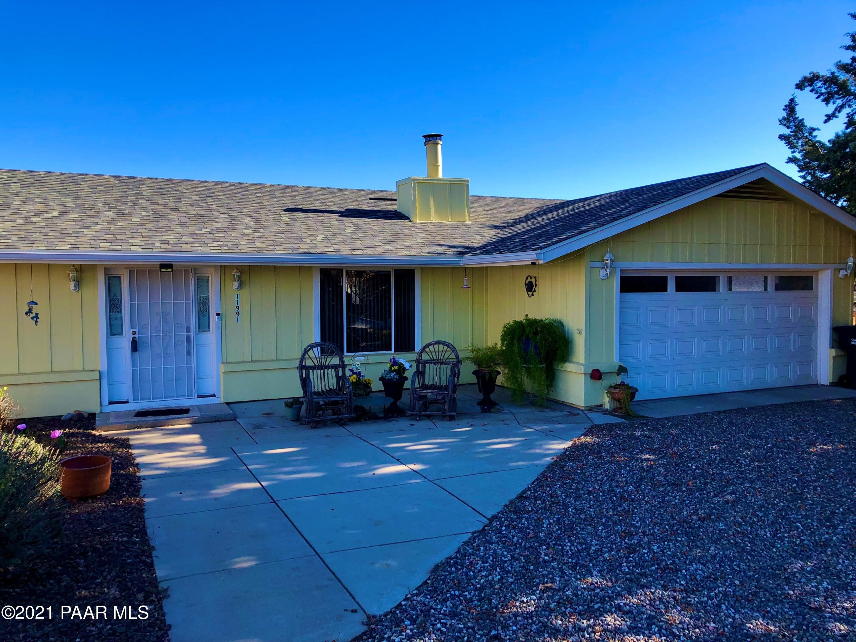 11991 Rawhide Ridge Dewey, AZ 86327 - Photo 29 of 29 a view of a house with patio