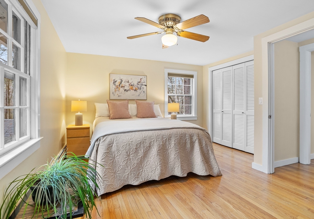 103 Newtown Road Acton, MA 01720 - Photo 20 of 42 a bedroom with a bed and a window