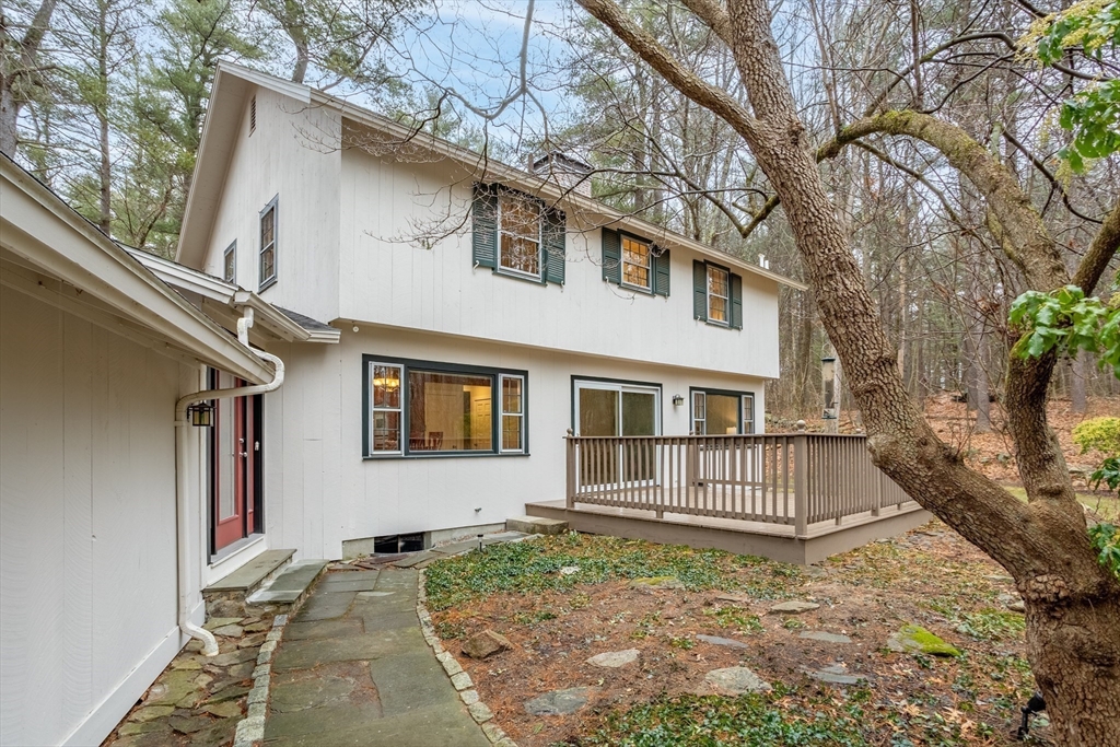 103 Newtown Road Acton, MA 01720 - Photo 29 of 42 a view of a house with a yard