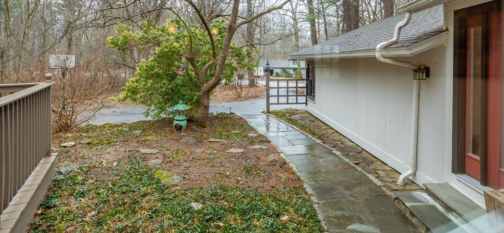 103 Newtown Road Acton, MA 01720 - Photo 37 of 42 a view of a back yard of the house