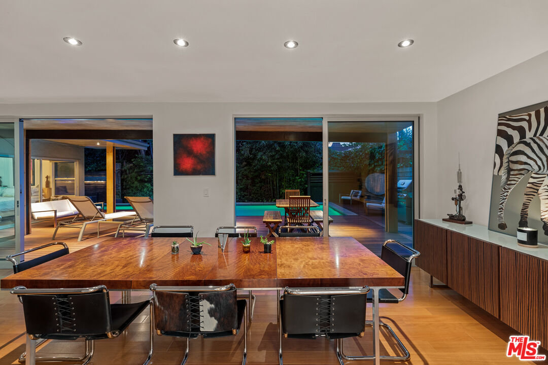 14840 Sunset Boulevard Pacific Palisades, CA 90272 - Photo 27 of 33 a view of a dining room with furniture window and outside view