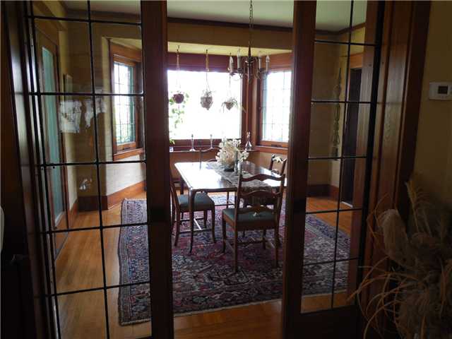 3 Castle Park Rochester, NY 14620 - Photo 3 of 25 Dining Room Hardwood floors with leaded glass door