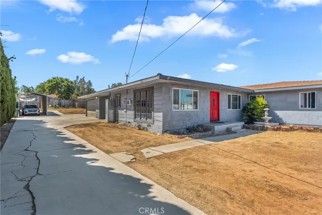 a house with yard in front of it