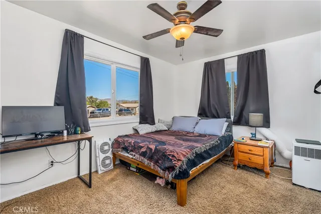 a bathroom with a shower and a toilet