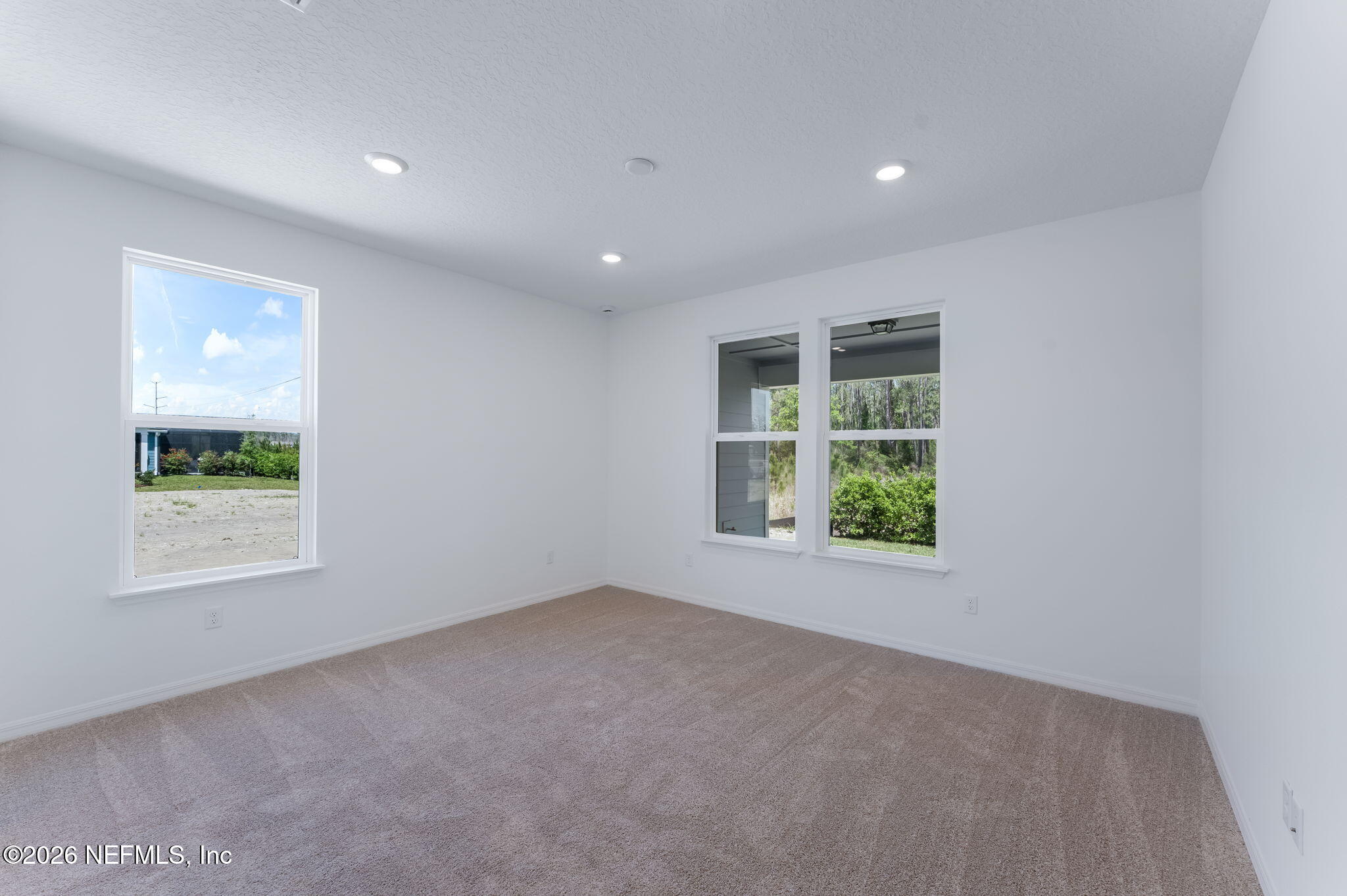 614 Ecliptic Loop Yulee, FL 32097 - Photo 22 of 60 24-web-or-mls-Primary Bedroom