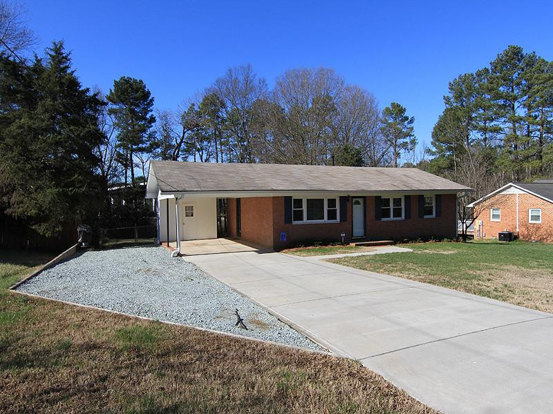 1822 Stage Road Durham, NC 27703 - Photo 2 of 16 Nice wide gravel parking pad for those extra vehicles! Exterior Front
